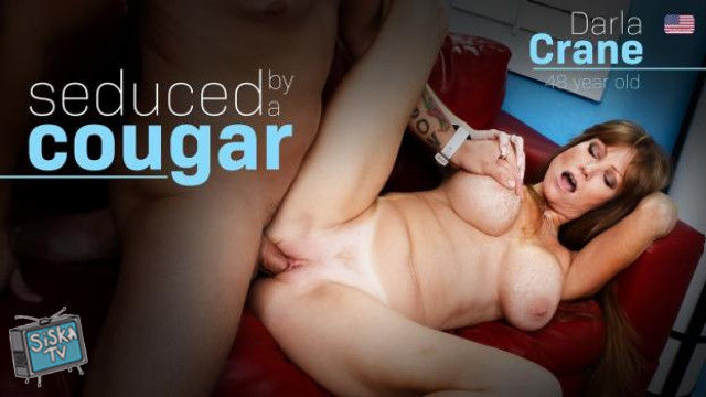 American MILF Darla Crane seduces a young man to fuck her wild at her house!